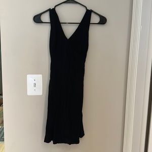 All black linen mini tie back flow dress!